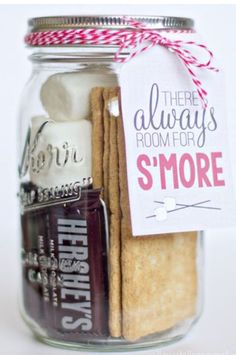 there is a jar with cookies and marshmallows in it that says, there always room for s'more