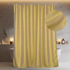 a yellow shower curtain in a bathroom with candles on the wall and a white toilet