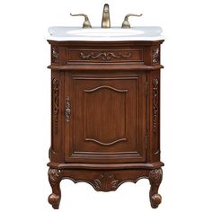 a bathroom vanity with a sink and faucet in it's center piece