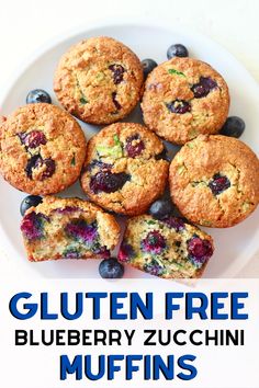 gluten free blueberry zucchini muffins on a white plate