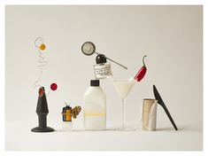 an assortment of liquor bottles and miniature objects