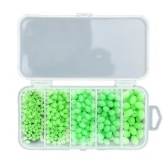 an open plastic box filled with green beads