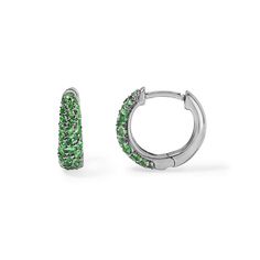 A classic twist on the pave huggie earring for a timeless accessory that embodies understated refinement. Crafted from gleaming gold and sparkling green tsavorites, these earrings feature a snug, hoop-like design that "hugs" the earlobe closely. Their simplicity and versatility make them an essential addition to any jewelry collection, effortlessly complementing both casual and formal looks. Available in 14K White, Yellow, and Rose Gold Green Tsavorite weight = 0.53 carats Inner Diameter = 9mm x Green Huggie Fine Jewelry Earrings, Green Huggie Earrings Fine Jewelry, Green Small Hoop Huggie Earrings Fine Jewelry, Elegant Green Small Hoop Huggie Earrings, Green Small Hoop Huggie Earrings, Green Huggie Earrings With Prong Setting, Green Gemstone Huggie Earrings, Huggie Earring, Diamond Cocktail Rings