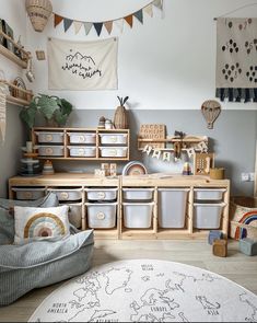 a child's playroom with toys and storage