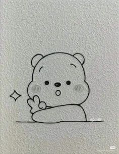 a drawing of a teddy bear sitting on top of a table