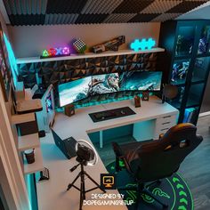 a computer desk topped with two monitors and a gaming chair sitting next to it on top of a hard wood floor