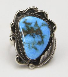 "- Vintage Large Sterling Silver & Natural Blue Turquoise Leaf & Swirl Design Ring - Ring Size 8.5 - Turquoise Stone measures 23mm tall by 17mm wide - Ring face measures 1.33\" tall by 1.03\" wide and .24\" deep - Ring weighs 9.4 grams - Ring is lovingly crafted but unsigned - Very good vintage condition with some patina to sterling silver, we have not cleaned, and some surface scratching to silver band (see pics)" Figural Jewelry, Swirl Ring, Wide Ring, Wide Rings, Swirl Design, Blue Band, Pink Stone, American Jewelry, Blue Turquoise