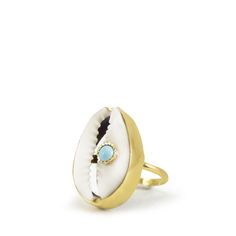 A reminder that sunny days are on the horizon, this ring is carefully handcrafted from 18k gold over silver featuring a cowry marked with a turquoise bead. Style it with its matching layered necklace from the Marina collection. Handmade from 18-karat Yellow Gold Over Sterling Silver (1 micron plating). We suggest to avoid contacts with soaps, detergents, chlorine and any other chemical substance that could alter the original characteristics of your jewel. When it is not worn, keep your jewelry p Handmade Open Ring Jewelry For Beach, Artisan Gold Turquoise Ring, Unique Gemstone Jewelry For The Beach, Gold Stackable Beach Jewelry, Gold Stackable Jewelry For Beach, Gold Stackable Jewelry For The Beach, Artisan Gold Jewelry For The Beach, Artisan Gold Jewelry For Beach, Artisan Gold Beach Jewelry