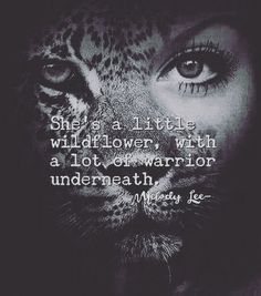 a black and white photo with a quote on the face of a tiger that says she's a little wildflower, with a lot of warrior underheaathh