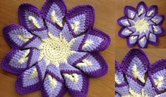 crocheted purple and white flower sitting on top of a wooden table next to another pattern