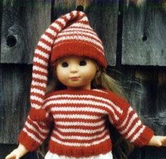 a doll wearing a red and white striped sweater with a knitted hat on it's head