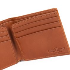 Improved classic design Embossed full grain vegetable tanned premium leather RFID - protected 3.3"H x 4.1"W x 0.5"D (folded) Holds 6 – 12 cards 2 slip pockets Flat bill section Fabric lining Branded gift box Imported Classic Trifold Card Holder With Smooth Grain, Classic Trifold Wallet With Smooth Grain, Classic Trifold Leather Wallet In Cognac, Classic Leather Trifold Wallet In Cognac, Classic Cognac Leather Trifold Wallet, Classic Cognac Trifold Wallet With Coin Pocket, Classic Cognac Wallets With Smooth Grain, Classic Cognac Wallet With Smooth Grain, Classic Cognac Bifold Card Holder