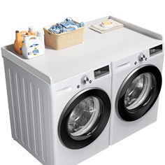 a white washer and dryer sitting side by side on top of each other