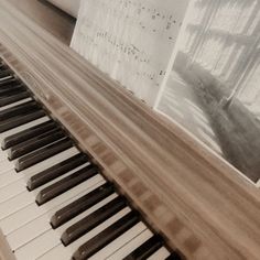 an old piano with sheet music on it