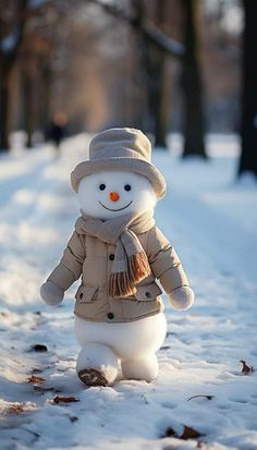 a small snowman is standing in the snow