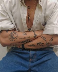 a man with tattoos on his arms