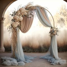 an arch decorated with flowers and greenery