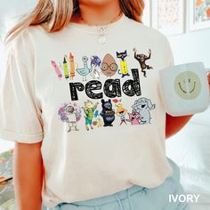 Read Children Books Shirt, Teacher Read Shirt, Kindergarten Gift Shirt,Comfort Colors,Read Kids Shirt,  Book Lover Shirt,Funny Kids Tee 1747 COMFORT COLORS - ADULT UNISEX - SHORT SLEEVE T-SHIRT - 1717 6.1 oz./yd² (US), 10 oz/L yd (CA), 100% ring-spun cotton, 30 singles Garment dyed for that lived in feel and almost no shrinkage at home. Soft ring-spun cotton fabric with 100% cotton threads Relaxed fit Topstitched, classic width, rib collar Shoulder to shoulder twill tape Signature twill label Ma Reading Shirts For Teachers, Fun Teacher Shirts, Teacher Vision Board, Casual Teacher Outfit, Teacher Tee Shirts, Teach Shirt, Book Character Day, First Day Of School Teacher, Teacher Accessories