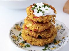 a stack of food sitting on top of a white plate