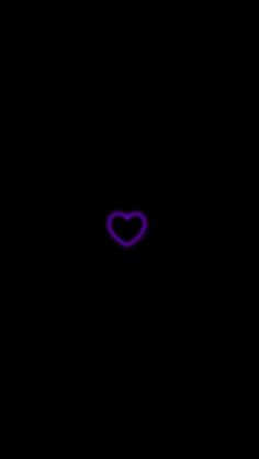 a purple heart on a black background