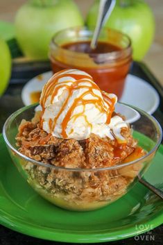 an apple dessert with ice cream and caramel drizzle