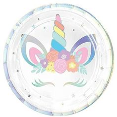 a paper plate with a unicorn face and flowers on it