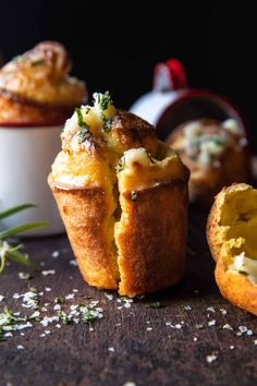 two muffins filled with cheese and herbs