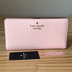 100% Authentic Brand New With Tags Madison Large Slim Bifold Wallet Saffiano Leather Conch Pink And Gold Hardware 6 3/4”L X 3 1/2”H Pink Kate Spade Wallet, Chic Kate Spade Bifold Wallet, Formal Pink Kate Spade Wallets, Kate Spade Wallet Pink, Kate Spade Card Holder, Small Leather Wallet, Leather Trifold Wallet, Bags Kate Spade, Card Case Wallet