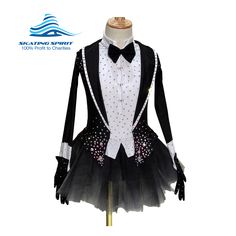 a black and white tutu skirt suit with polka dots