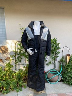 "Vintage ski overalls and matching jacket by Mountain Products Corp.  Down jacket zips up the front with zippered pockets and sleeves.  Has zipper across the bottom to zip onto overalls if desired.  Overalls have elastic straps with attached suspenders.  Set is in great condition.  Overalls have pilling on the inside lining and the right leg has a couple of small tears at the hem.   label:  Mountain Products Corp fabric:  overalls nylon, jacket nylon and down size:  not listed.  Size women M or men S is just an estimate.  Please check measurements for an accurate fit.  Questions are welcome! Set was measured across the front side lying flat. overalls underarm to underarm 19 1/2\" hips (taken at the bottom of the zipper) 22\" shoulder to crotch 29\" (plus several inches by adjusting the str Black Skiing Outerwear With Pockets, Fabric Overalls, Ski Overalls, Overall Outfit, Suspenders Set, Vintage Ski, Bib Overalls, Winter Snow, Suspenders