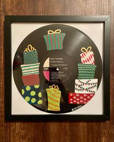 a vinyl record with christmas presents on it