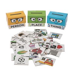 several different colored boxes with stickers on the front and one has an image of a person's face