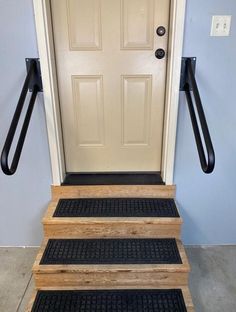 a set of stairs leading up to a door