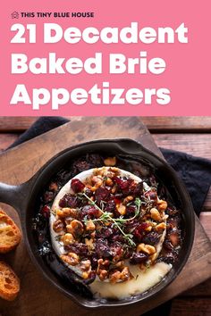 an iron skillet with baked brie appetizers in it