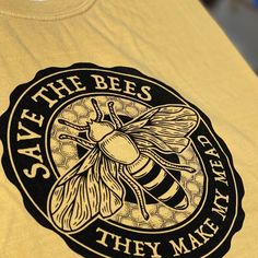 a t - shirt that says save the bees they make them