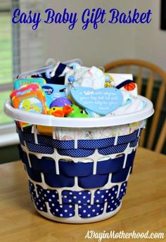 a basket filled with baby items sitting on top of a table