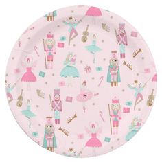 a pink paper plate with nutcrackers and ballet characters on the front, in pastel colors