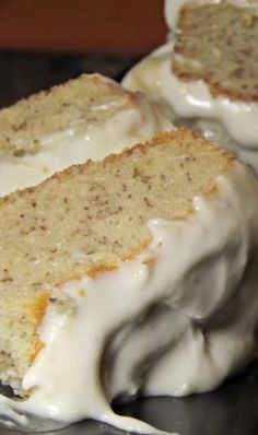 a close up of a cake with frosting on a plate