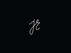 the letter j is written in cursive writing on a black background with white ink