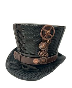 steampunk Top hat Gothic top hat. Hand crafted  This is a black textured leatherette  fabric with leatherete trim top hat  design Steampunk  top hat by SDL. It has a front and back corseted detail and metal cog detail please refer to photos .  Please note any markings or creases in the fabric is not a defect but characteristic and nature of the fabric . Any tracings of glue is not a defect this is a hand crafted hat  This is a size  59 Cm  Thank you for looking Steam Punk Hat, Steampunk Dragon, Steampunk Top, Steampunk Top Hat, Steampunk Dress, Steampunk Hat, Gothic Tops, Steampunk Corset, Steampunk Wedding