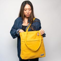 work shoulder bag#color_mustard-yellow Everyday Yellow Canvas Bag, Rectangular Yellow Bag For Organization, Functional Yellow Everyday Bags, Functional Yellow Shoulder Bag For Everyday, Work Aesthetic, Tote Bag With Pockets, Bag With Pockets, Work Tote Bag, Feeding America