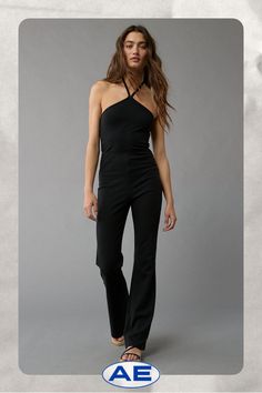 Soft, lightweight knit/High y-neck/Flared leg Chic V-neck Elastane Jumpsuits And Rompers, High Stretch Solid V-neck Jumpsuits And Rompers, High Stretch Solid Color V-neck Jumpsuit, High Stretch Jumpsuits And Rompers For Spring, Stretch Elastane Jumpsuits And Rompers For Night Out, Stretch Elastane Jumpsuit For Night Out, Chic Fitted V-neck Jumpsuits And Rompers, Fitted V-neck Jumpsuits And Rompers For Date Night, Chic Elastane Jumpsuits And Rompers For Spring