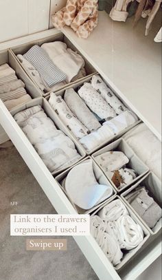 an organized drawer with cloths and other items in it that says, link to the drawers organizers i used swipe up