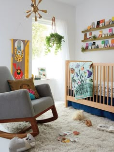 a baby's room with a rocking chair and crib