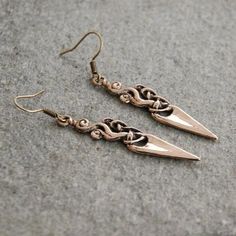 Delicate earrings made in Urnes style The body is made of bronze Earwires are antiallergic Not heavy - 5g is the wage of the pair Total length: 60 mm / 2.4 in Ideal both, as addition to Viking or Slav historical outfit, as well as everyday fashion jewelry ✩ ✩ ✩ ✩ ✩ Visit us on FB @barbariann.jewelry and Instagram @barbariann_jewelry where you can see snapshots from our workshop ✩ ✩ ✩ ✩ ✩ Bronze Drop Plug Earrings, Bronze Metal Drop Earrings, Bronze Drop Earrings, Bronze Metal Pierced Chandelier Earrings, Bronze Dangle Metal Earrings, Bronze Brass Earrings With French Hook, Bronze Metal Dangle Chandelier Earrings, Bronze Single Dangle Earring, Bronze Metal Plug Earrings