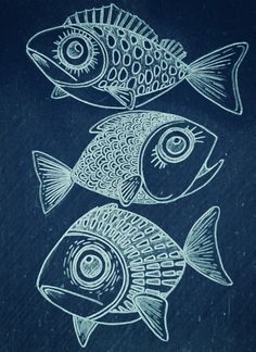 two fish drawn in chalk on a blackboard with blue chalk and white marker paint