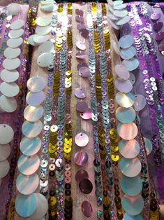 many different colored sequins are on display