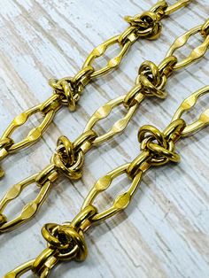 This chain consists of alternating 14mm x 7mm textured oval and smooth twisted links, joined together by 7mm oval and round links. This chain makes a bold and decisive statement. Use it to make necklaces, bracelets, and anklets. Dangle your favorite pendant, charm, and clasp to create your unique jewelry design. Twisted Link Chunky Gold Plated Chain Size of links: 14x7mm and 7mm links Finish: Real 18k Gold Plated plus Antique Finish Base metal: 304 Stainless Steel Soldered 14mm and unsoldered 7m Golden Chain, Unique Jewelry Designs, Antique Finish, Gold Plated Chains, Diy Jewelry Making, Jewelry Making Supplies, Base Metal, Anklets, Halloween Shopping