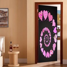 a room with a door decorated with pink hearts