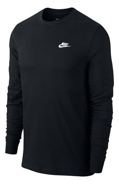 A small Swoosh logo at the chest brings big Nike energy to a T-shirt made from breathable cotton for comfort whether you're working out or just hanging out. 28" length (size Medium) Crewneck Long sleeves 100% cotton Machine wash, tumble dry Imported Long Sleeve Cotton Workout T-shirt, Dri-fit Crew Neck T-shirt For Sportswear, Dri-fit Crew Neck T-shirt For Streetwear, Casual Crew Neck T-shirt For Training, Casual Crew Neck Training T-shirt, Black Athleisure Tops With Branding, Moisture-wicking Tops For Streetwear, Moisture-wicking Dri-fit Tops For Streetwear, Nike Long Sleeve Moisture-wicking T-shirt